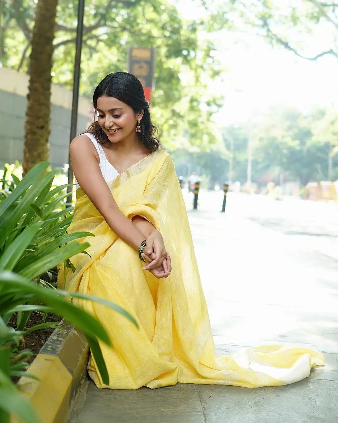 Avantika Mishra Stills in Yellow Saree White Sleeveless Blouse